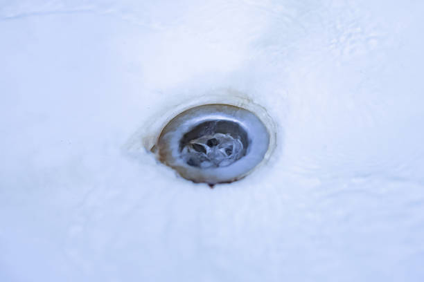 istock close up water pours throught the wash sink 1168730834