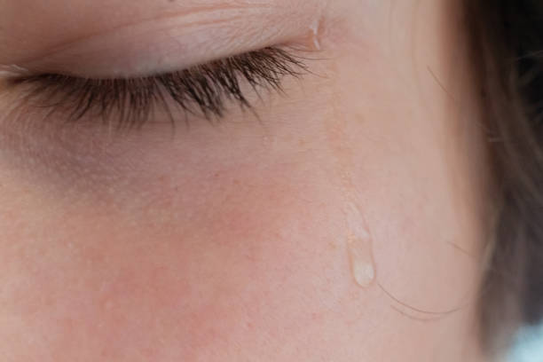 istock macro shot of man tear, disappoint and desperate concept 1168731468