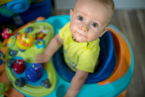 istock First steps of the boy in a baby walker 1168732955