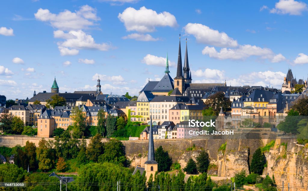 Luxembourg Old Town View of the Luxembourg Old Town with the towers of the Notre Dame Cathedral under a nicely clouded sky Luxembourg - Benelux Stock Photo