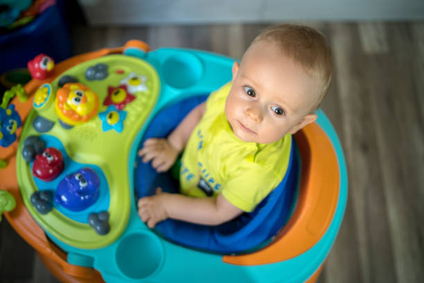 istock First steps of the boy in a baby walker 1168733251