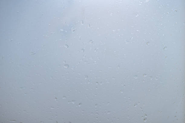 istock Water droplets on the glass wall. Abstract background. 1168735507