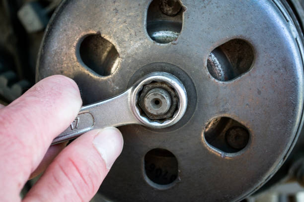 istock Automobile repair. Repairman working. 1168737896