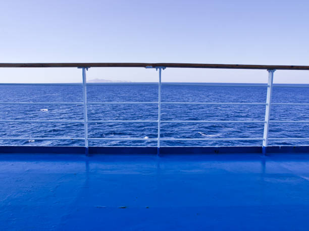 istock Ferry deck and railings with sea and horizon line background. 1168738654