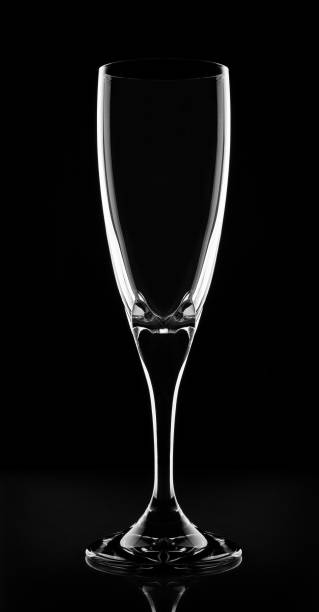 istock Champagne glass on a black background 1168740061