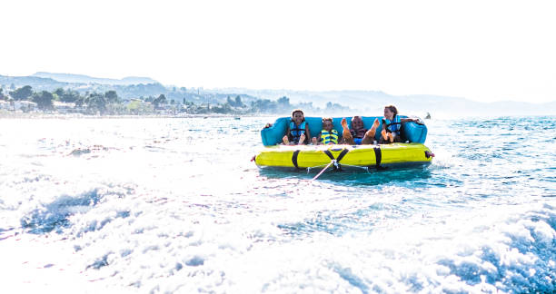 istock Family enjoying water ride 1168742954