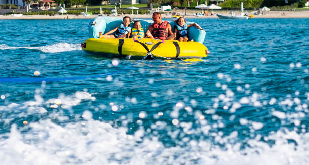 istock Family enjoying water ride 1168743063