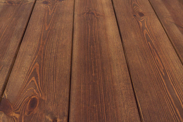 istock Brown textured wooden boards. Matte coating. 1168746734