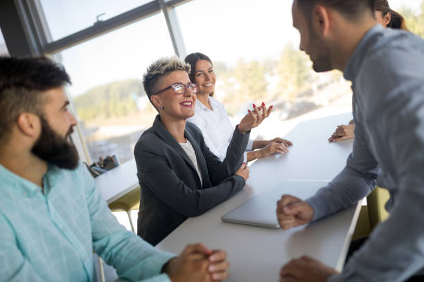 istock Business people having fun in modern office 1168748366