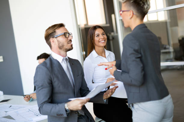 istock Business people having fun in modern office 1168748581