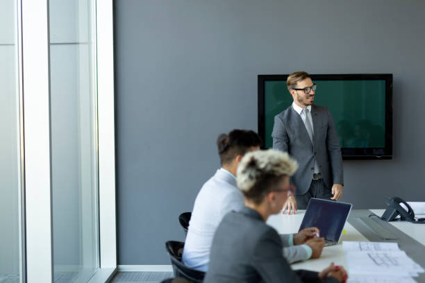 istock Group of business people collaborating in office 1168749328