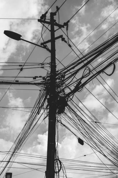 istock Tangle of Electrical Wires on Power Pole 1168751236
