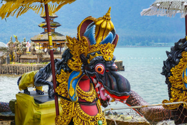 Dragon fountains at Balinese Hindu temple Ulun Danu Beratan Temple, Bali, Indonesia. Dragon fountains at Balinese Hindu temple Pura Ulun Danu Beratan, Tabanan, Bali, Indonesia. floating temple in lake bedugul bali stock pictures, royalty-free photos & images