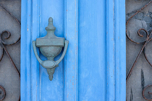 Part of blue old painted door with vintage handle