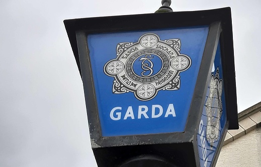 Scene Of Building Exterior, Sky And Irish National Police Sign Garda During The Day At Newbridge County Kildare In Republic Of Ireland Europe