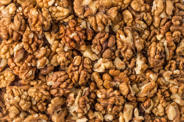 фон грецкого ореха - walnut стоковые фото и изображения