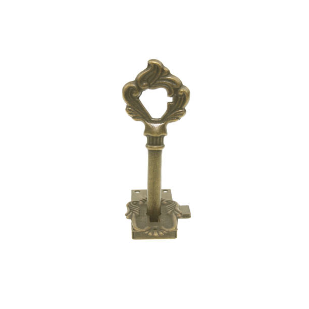 istock Old key and keyhole isolated on white background with clipping path. 1168755079