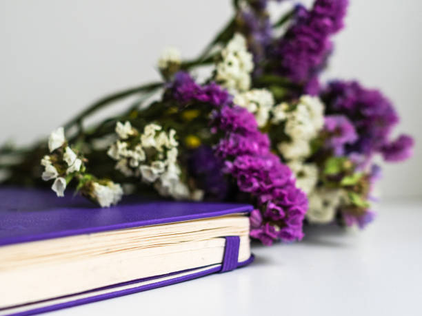 istock Bouquet of dry purple flowers is a notebook. Notebook for personal notes and ideas 1168756199