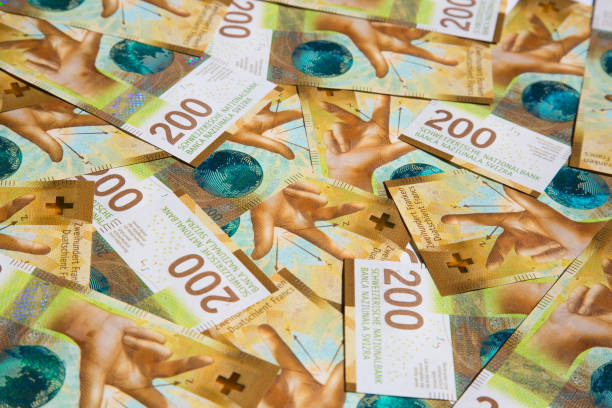 francos suizos - swiss francs swiss currency switzerland finance fotografías e imágenes de stock