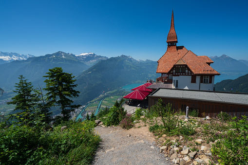 Church of Ornon village. This image was taken during a sunny summer day in Ornon small village streets in Oisans massif, Alps mountains, in Isere, Auvergne-Rhone-Alpes region in France.