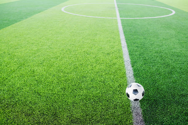 istock Soccer ball on artificial turf for green background. 1168759117