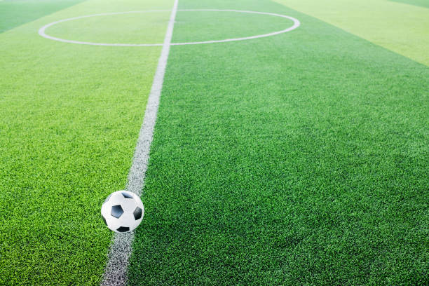 istock Soccer ball on artificial turf for green background. 1168759354