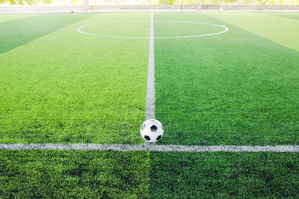 istock Soccer ball on artificial turf for green background. 1168759461