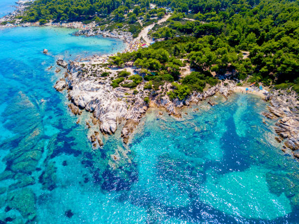Beach Aerial photo of the beautiful beach on Sitonia, Chalkidiki region, Greece aegean islands stock pictures, royalty-free photos & images