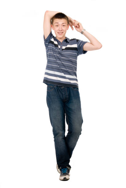 istock Cheerful young man in full growth isolated over white background 1168763125