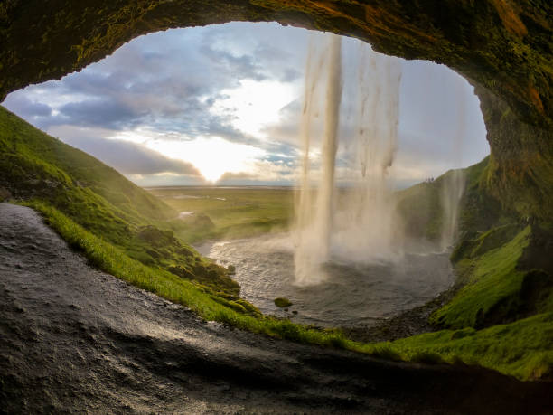istock View of dusk from behind Seljalandsfoss 1168766811