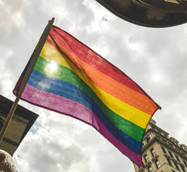 istock Pride flag blowing in the air 1168766842