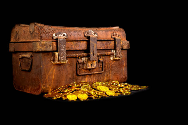 istock Stacking Gold Coin in treasure chest  on black background 1168770056