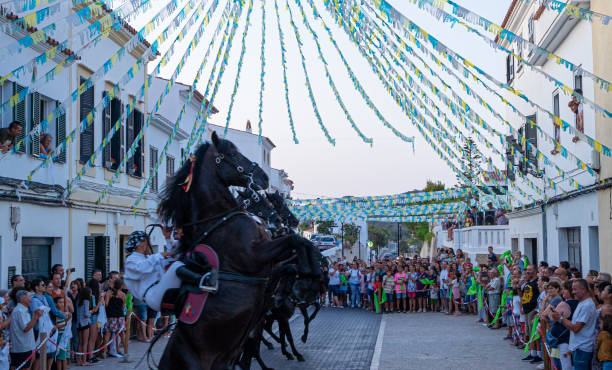 Riders rear up on his horse during a horse celebrations in the Spanish island of Minorca stock photo