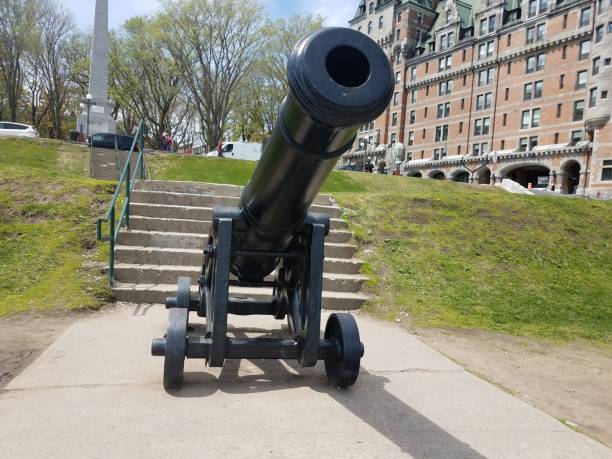 istock old black cannon on wheels in Quebec, Canada 1168775202