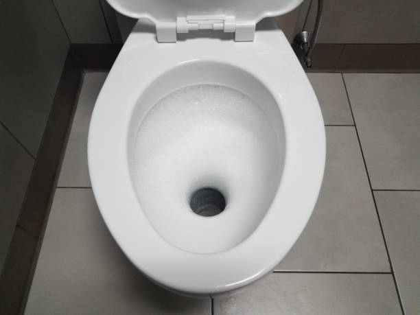 istock white toilet with bubbles in restroom or bathroom 1168776128