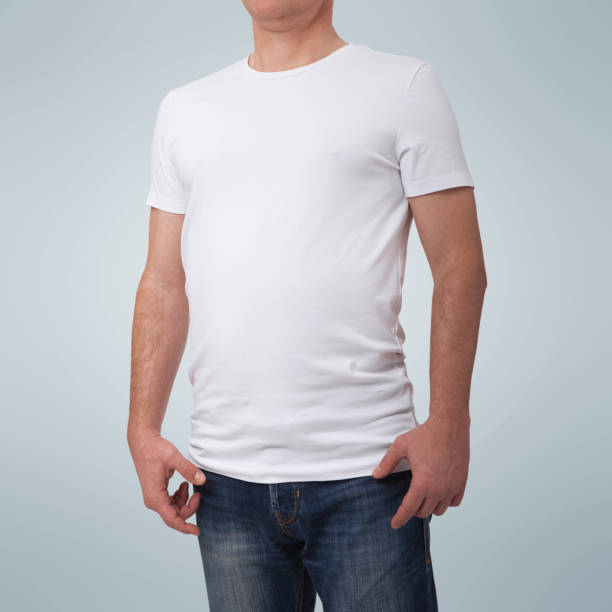 istock Man wearing blank t-shirt isolated on gray background with copy space. Tshirt design and people concept - close up of man in blank white t-shirt isolated. For mock up template design. View front 1168776399