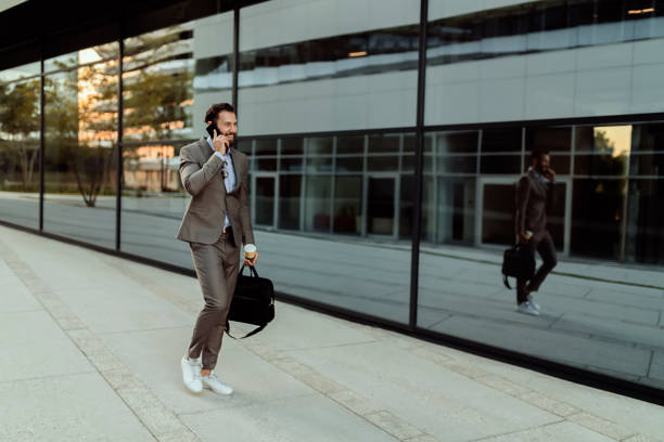 istock Businessman Talking on Mobile Phone 1168777754