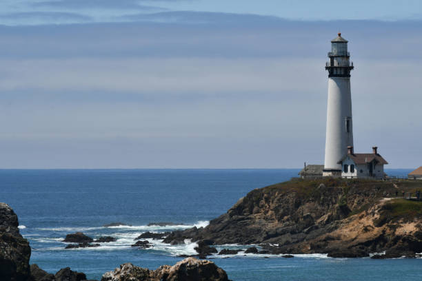 istock Lighthouse and Rocky Coastline 1168780422