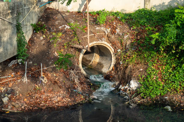 istock drain pipe or effluent or sewer release wastewater into river. Sewage or domestic waste water or municipal waste water that is product by community of people. wastewater is any water that has been use 1168781249