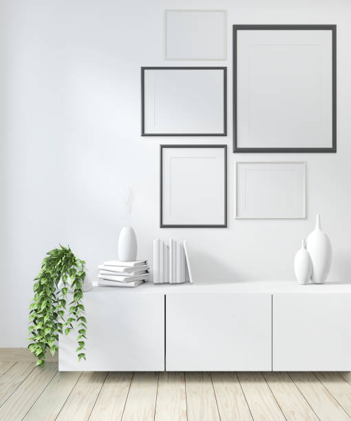 istock Mock up poster frame room with sofa green and decoration plants.3D rendering 1168781764