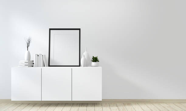 istock Mock up poster frame room with sofa green and decoration plants.3D rendering 1168781845