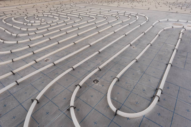 underfloor heating system installation. close up on water floor heating system interior of a new indoor swimming pool and spa center. plumbing pipes. individual heating. - glowing hot imagens e fotografias de stock