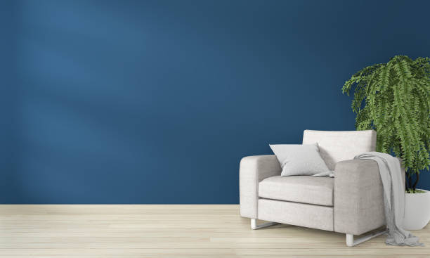 istock Neutral interior with velvet armchair on empty blue dark wall background. 3D rendering. 1168783085