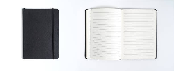 istock Notebook mock up with clean black blank for design and advertising. Notepad with chromed spring and free copy space template. On the gray background. 1168784304