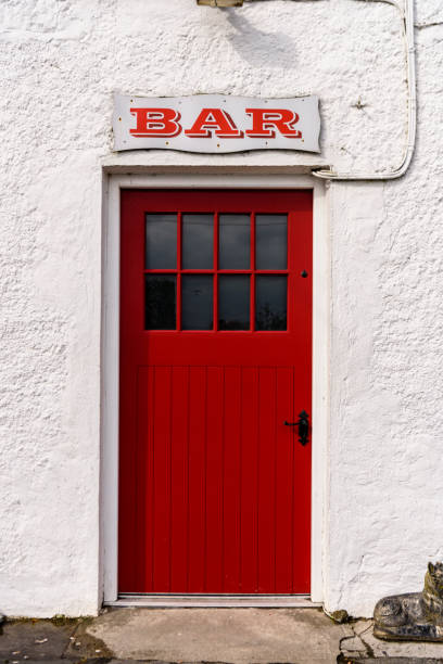 istock Red door into an Irish pub 1168785353