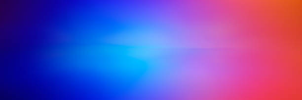 Abstract composition, blurred background. Orange, pink, blue and light spots dark background.