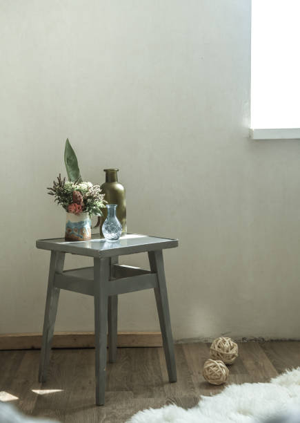 istock home chair with a beautiful flowerpot and decorative items 1168788262