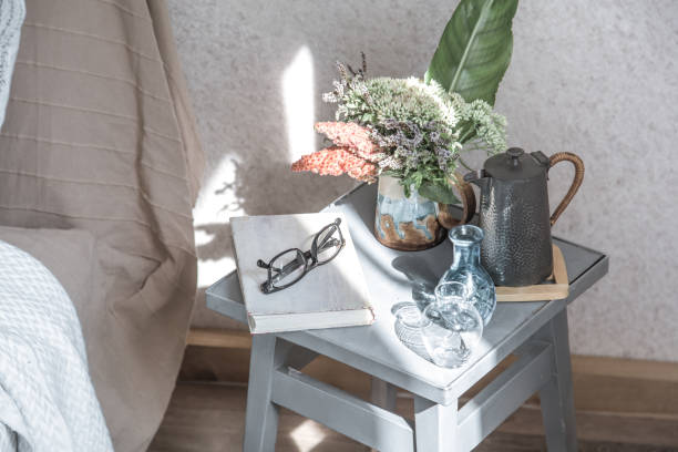 istock home chair with a beautiful flowerpot and decorative items 1168788263
