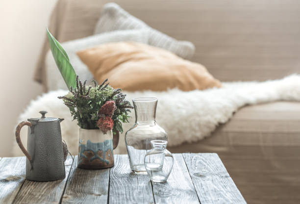 istock Home interior with decorative items on a wooden table. 1168788267