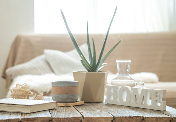 istock Home interior with decorative items on a wooden table. 1168788274